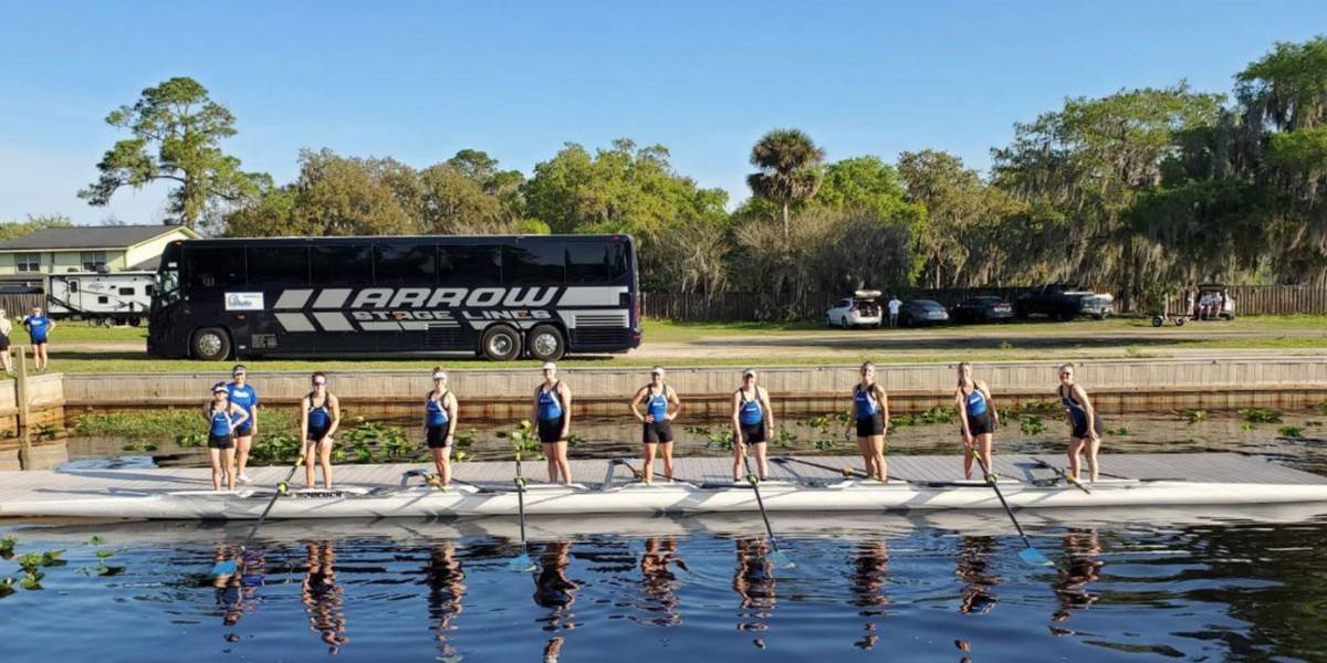 Floating docks for rowing facilities being used by a rowing team.