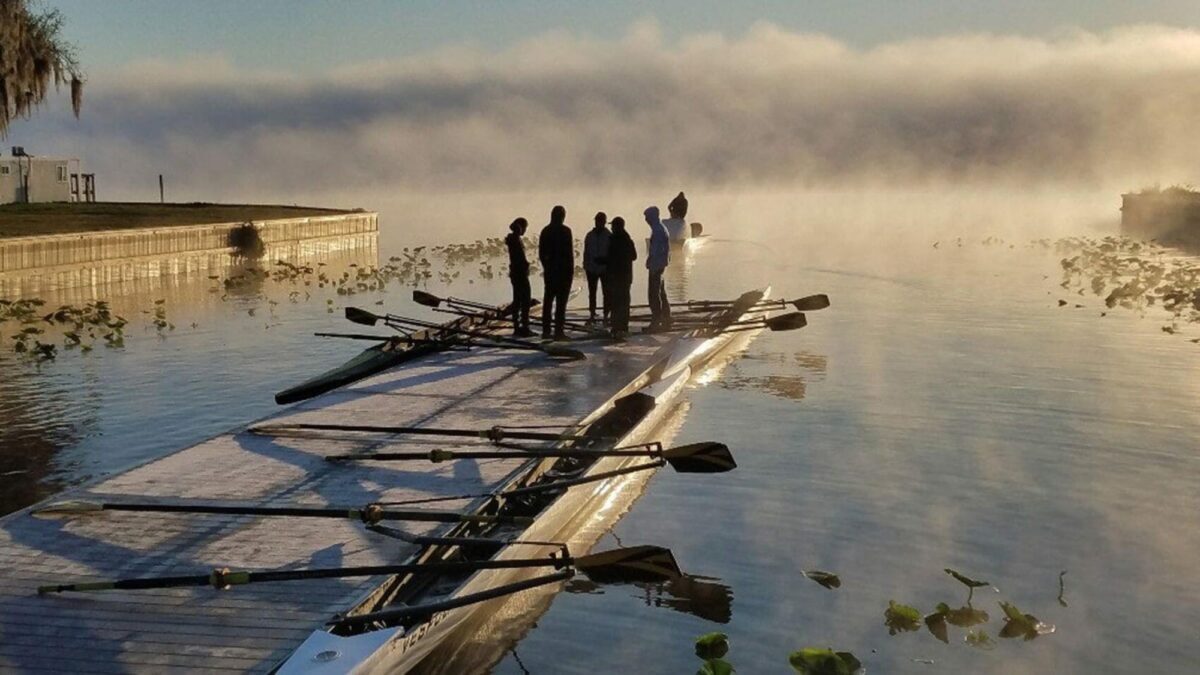 Rowing Starting Docks with people on the dock surrounded by fog.